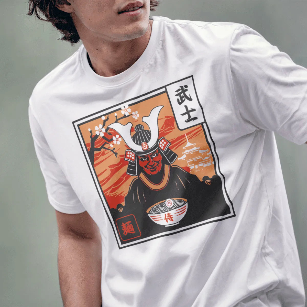 Male model in white t-shirt with samurai, noodles, cherry blossoms, japanese t-shirts, cultural symbols.