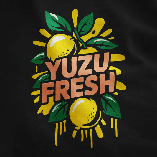 Close-up of "YUZU FRESH" yuzu lemons and green leaves on black fabric, graphic design t shirt, contrast in colors.