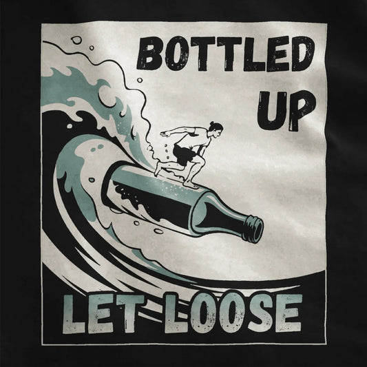 Black fabric close-up showing dynamic bottle surfboard, seafoam waves, and retro surf culture lettering.