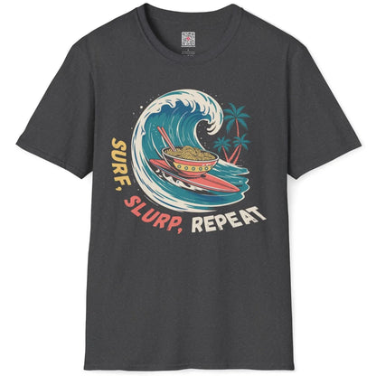 Dark heather t-shirt flatlay featuring graphic surf wave, ramen art, and palm tree accents in playful style.