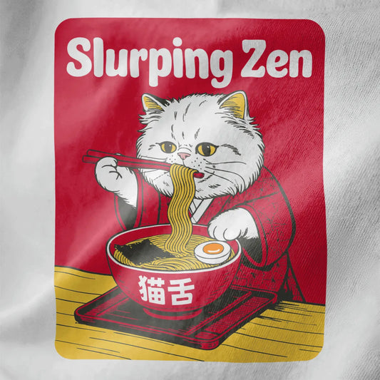 Close-up of white t-shirt fabric with cat in red kimono slurping ramen noodles, playful zen theme.