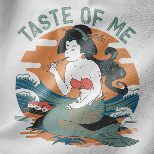 Close-up of mermaid sushi design on white fabric, featuring Japanese wave artwork and vibrant sunset colors.