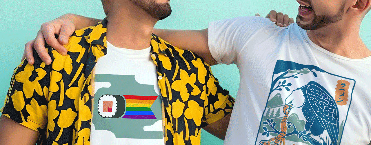 Two male friends wearing Japanese food graphic t-shirts from WAKUWAKUMA, smiling and enjoying together.